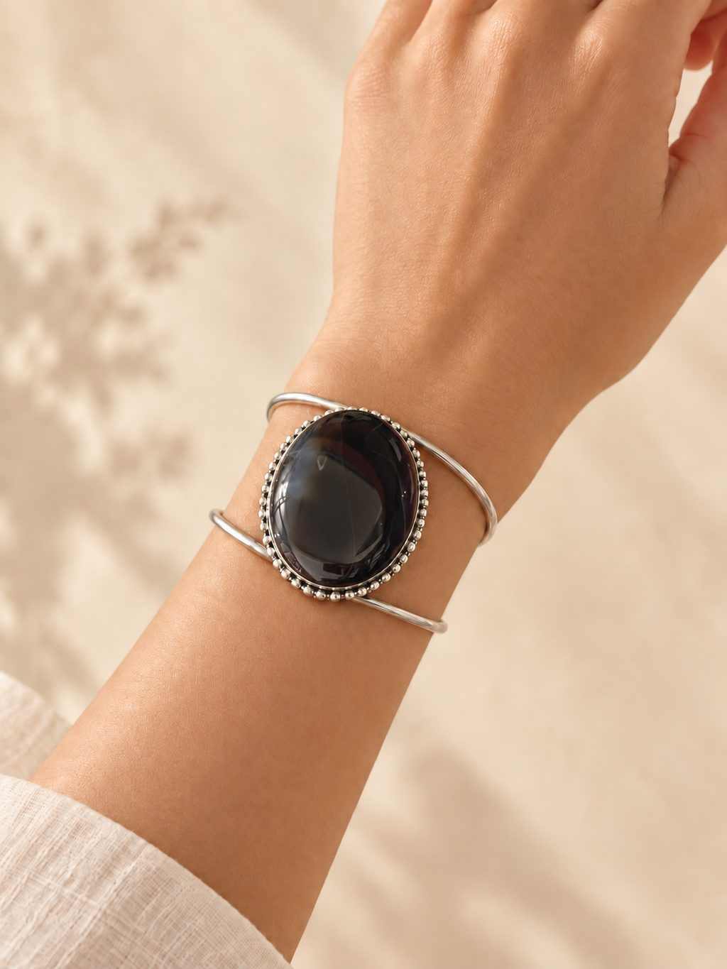 Cuff 12 — Black Plum Bead Edge — hand try-on