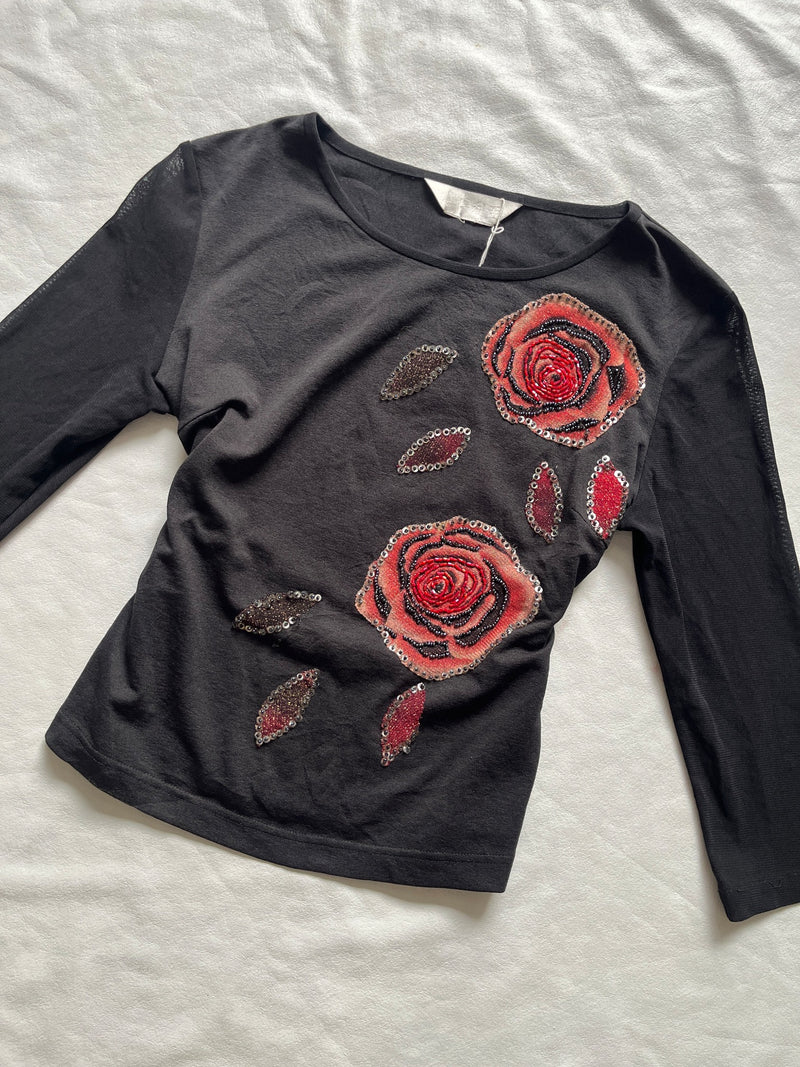 Black long sleeve rose applique top angled front view