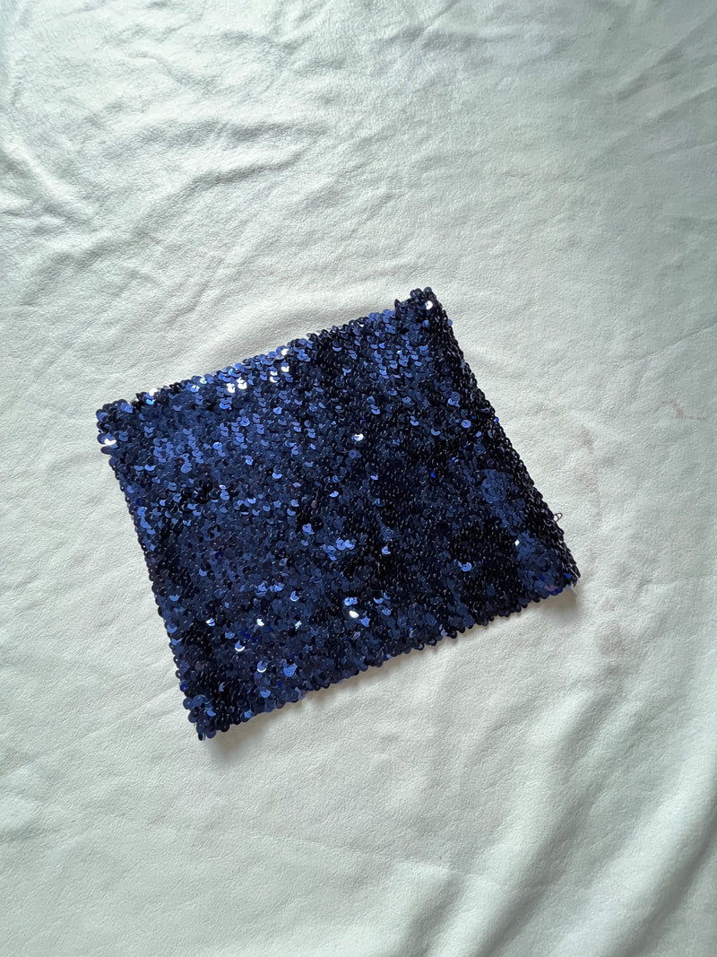 Navy blue sequin tube top angled view