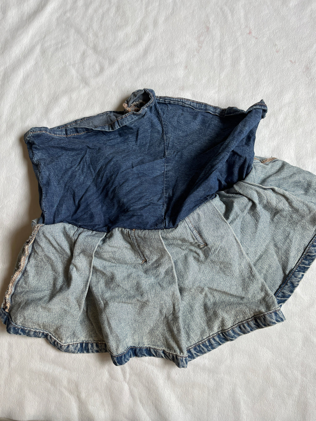 pleated denim skirt