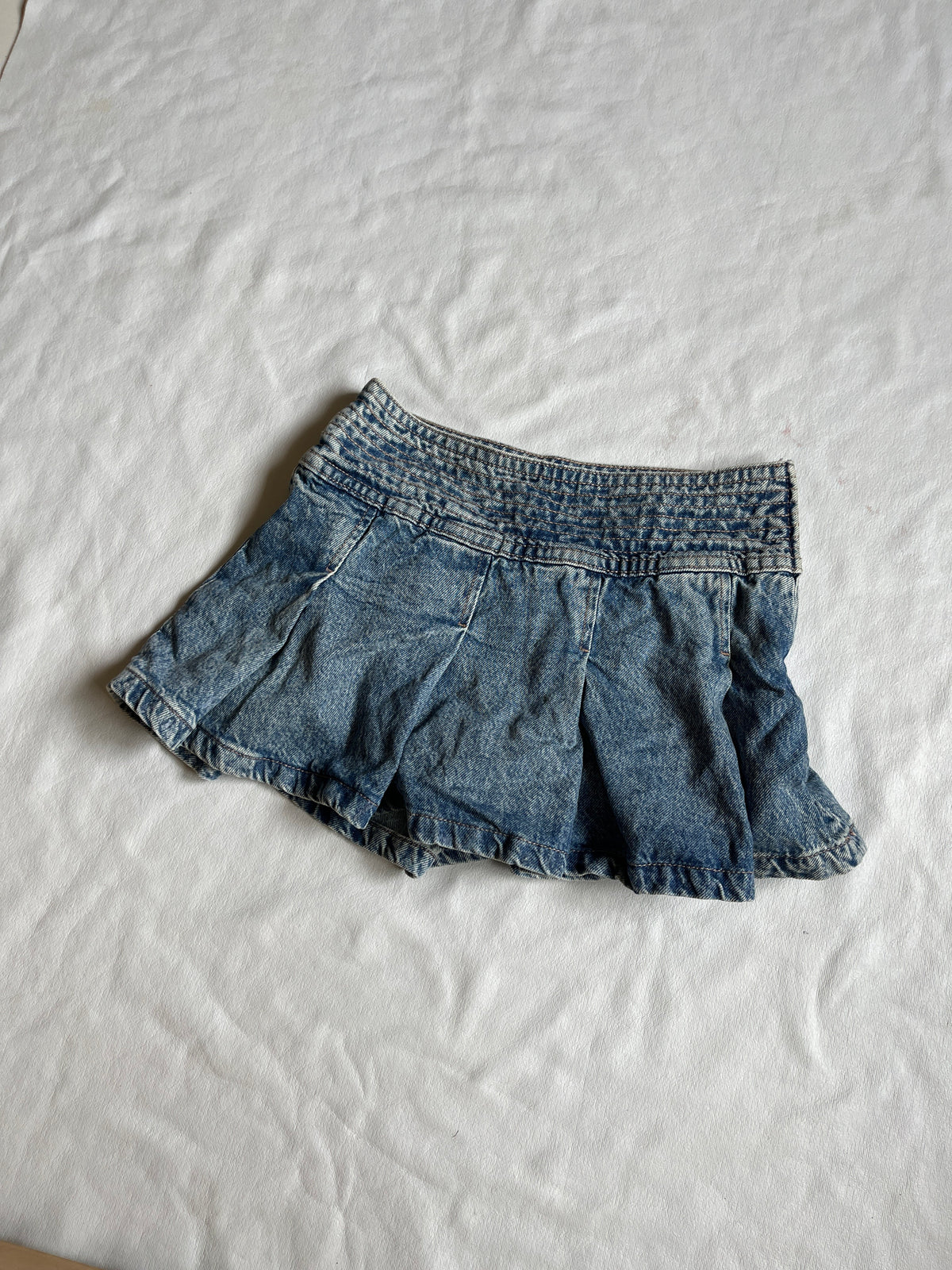 pleated denim skirt